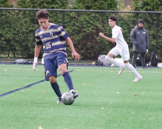 Pope John's Teo Fedullo possesses of the ball.