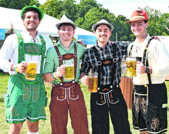 <b>Luke Pascarella of Millstone, Bobby Hunter of Monroe, Nolan Shade of Vernon and Nick Cavallero of Howell pose for a photo in costume.</b>