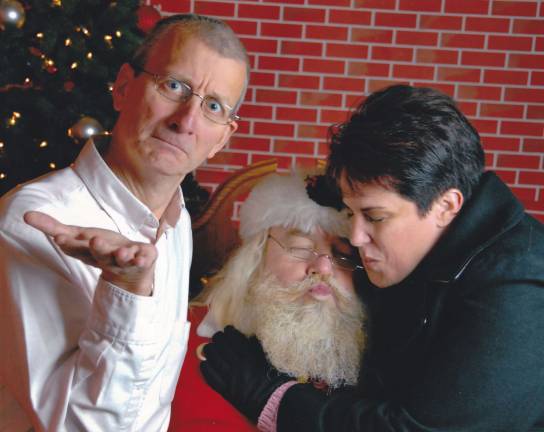 Submitted by Dan Karpf of Andover, N.J. &quot; I Caught My Wife Kissing Santa. It was fun posing with this Santa Claus!&quot;