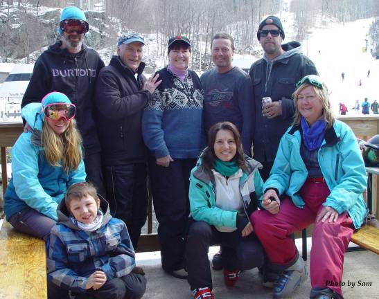 Mountain Creek die-hard riders and skiers toast an April Fool&#x2019;s snow storm surprise and thank the MC Management for remaining open on April 2nd on the deck of the Kink&#x2019;s Restaurant. L to R Front Heather, son John, Lori, Mellissa. Back Row: Ryan, John, Buffy, Aaron, and Jacob