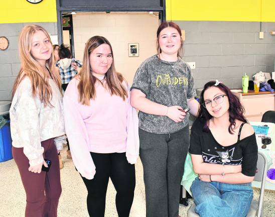 <b>Callie Stein, Avery Rittman, Carli Williams and Carmen Olsen from Vernon pose for a photo.</b>