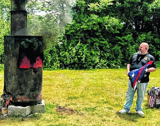 <b>The Sussex Elks recently held a flag retirement ceremony.</b>