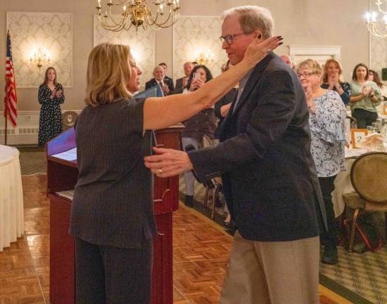 PIX1 The Sussex County Chamber of Commerce president, Tammie Horsfield, greets Richard Lecher, who won the Lifetime Achievement Award. (Photo provided)