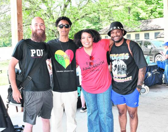 <b>Stephen Rochette of Sussex, Lorant Mena of Sussex, Olivia Webster of Newton and Jery Chapusette of Delaware pose for a photo.</b>