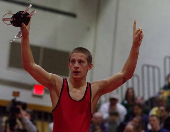 High Point's Mike Derin raises his arms in triumph after winning in the finals Saturday evening in the 132 lbs category.