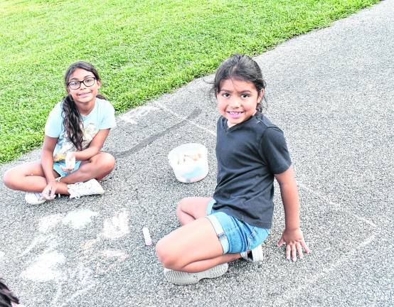 <b>Esmeraldo and Emma Umana of Vernon pose for a photo.</b>