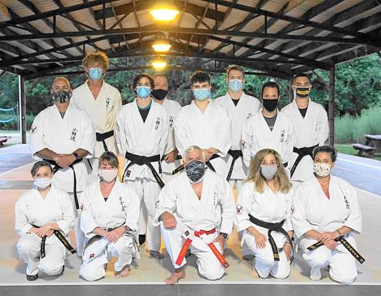 Vernon Valley Karate Academy first to fourth degree black belt students with Sensei Tom Shull in the middle, first row.