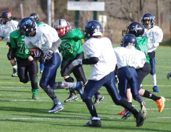 White linebacker Matt Schweizer on the move with the ball after intercepting it.