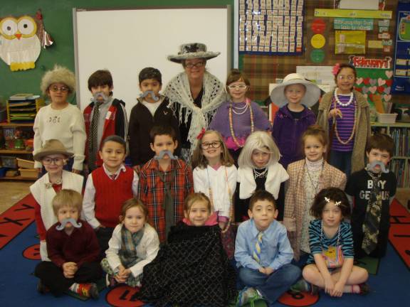 Mrs. Puskas' class is shown during the 100th day of school.