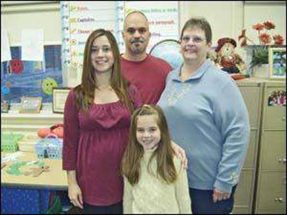 Teacher hits milestone