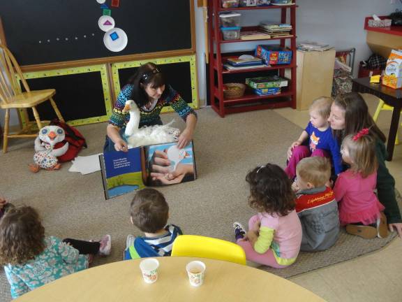 Photo by Scott Baker Leesa Beckmann reads her latest book, &quot;You Can't Potty Train a Goose,&quot; to the Fireflies class at Great Beginnings preschool.