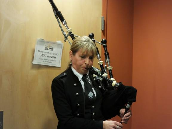A selection of 'Amazing Grace' was played with bagpipes by Laura Fagan.