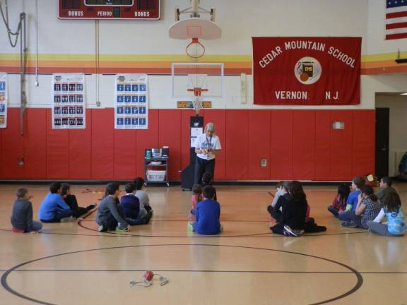 CMPS Physical Education TeacherLeslie Deutch gives pre-Jump Rope for Heart instructions to one of her third-grade classes.