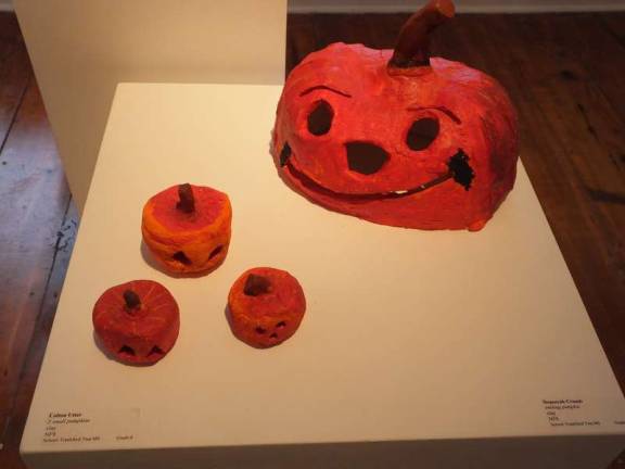 Sixth graders Colton Utter and Sequoyah Crumb created these expressive pumpkins on display. The two artists are students at Frankford Township Middle School.