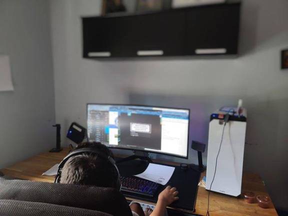 One of Jesse Sanchez’s children at his home setup for virtual learning. (Photo provided)
