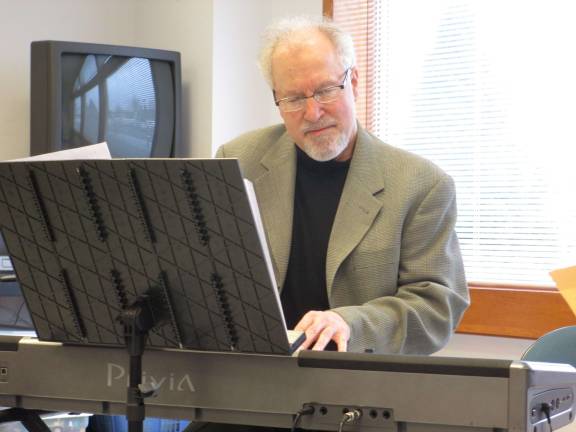 Photo by Viktoria-Leigh Wagner Pianist Mitch Schechter of West Milford accompanies Vinniei Cutro during the live perfomance at the Sussex-Wantage Library.