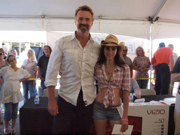 Actor John Schneider and Daisy Duke Contest winner Daniela Sangiovanni of Sussex.
