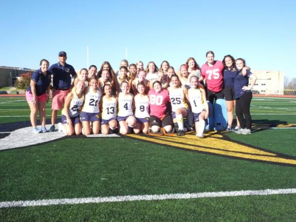 The Vernon Township High School varsity field hockey team and coaching staff pose after their victory over Sparta on Oct. 27.