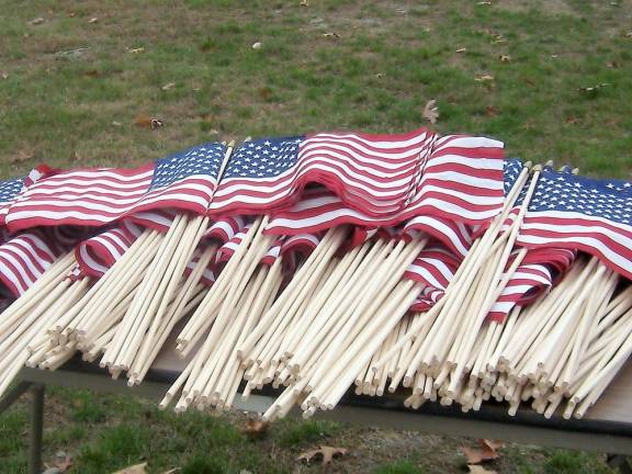 Flags await placement on veterans' graves (Photo by Janet Redyke)