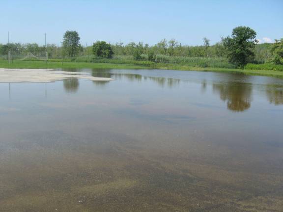 With extremely rainy weather for two weeks, the lot was transformed into a &quot;new lake.&quot;