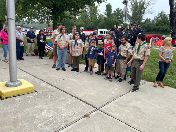 VN3 Members of Boy Scout Troops 404 and 283 and Club Scout Pack 183 prepare for the flag salute.
