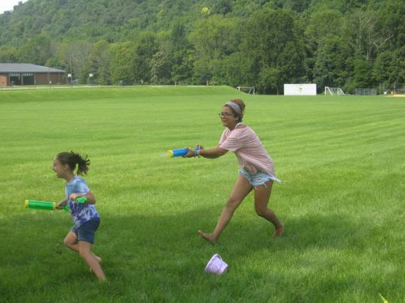 Soungsters cool in the pool at the Water Palooza sponsored by the Vernon Fire Department.