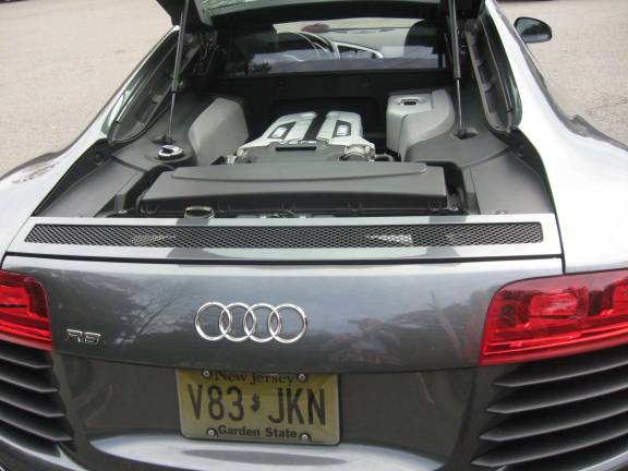 A 2008 Audi R8 has its engine in the rear of the sporty car.