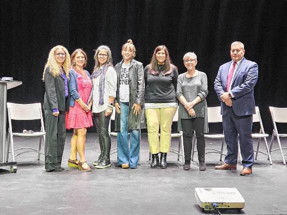 At left, Michele Wolf, executive director of the Center for Prevention &amp; Counseling, with others at a Recovery Strong event.