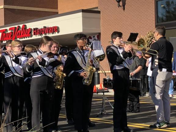 The Wallkill Valley Regional High School Marching Band performs outside tbe new supermarket. (Photo by Kathy Shwiff)
