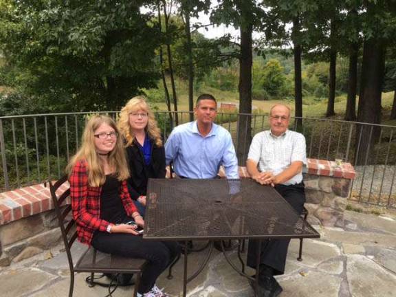 From left, Brynne Alemy, JoAnn Alemy, Chief Bret Alemy of the Hardyston Police and Gil Taglialatela, retired chief of Andover Township Police.