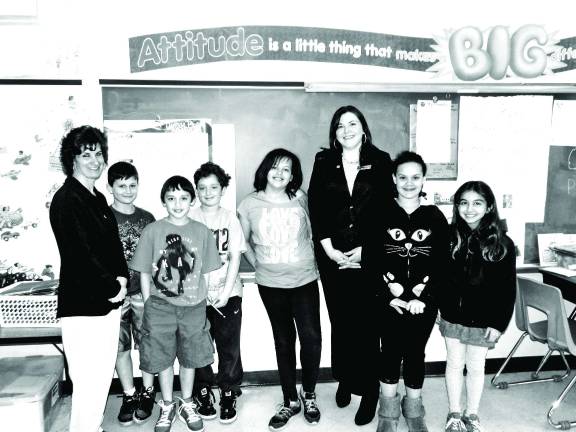 From left: Jannine Czifra, Trevor Free, Ty del Rosario, Alex Kniazev, Amanda Jasiczek, Jennifer Harkey, Katie Villafana, and Aisha Sadek.