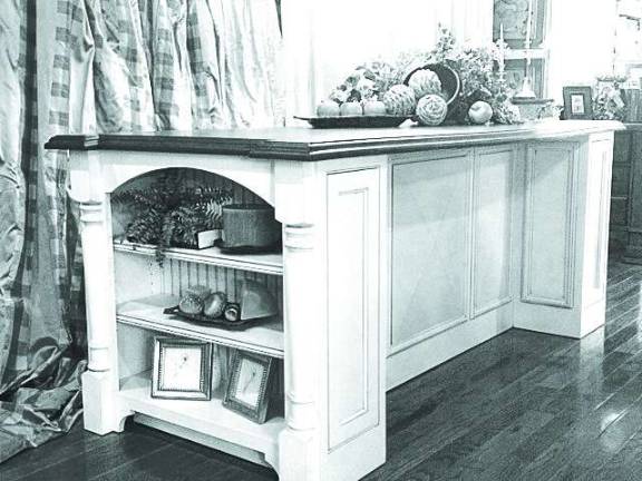 A kitchen island at Designs by Monica in Vernon.