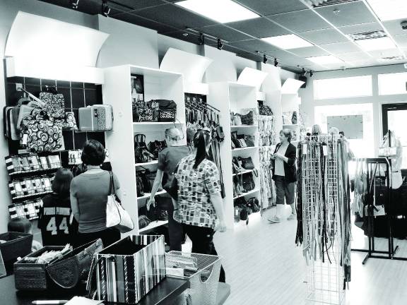 There was something for everyone at the grand opening of Handbags &amp; More Galore.