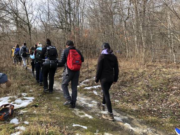 Hikers start off on the First Day Challenge Hike on Sunday, Jan. 1 in High Point State Park.