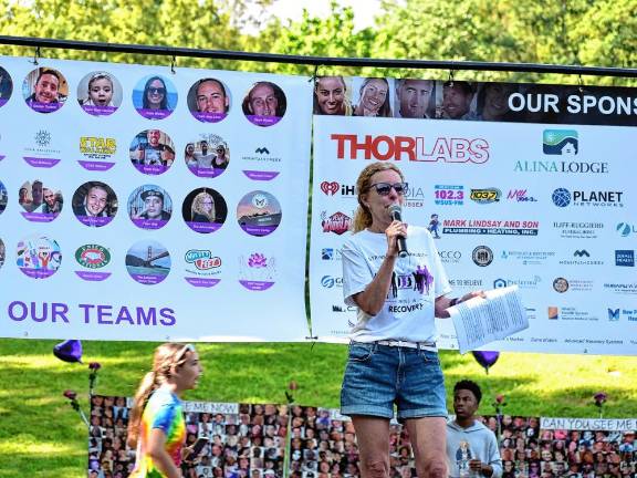 Michele Wolf, executive director of the Center for Prevention &amp; Counseling, speaks at the Change the Face of Addiction Walk last August. (Photos provided)