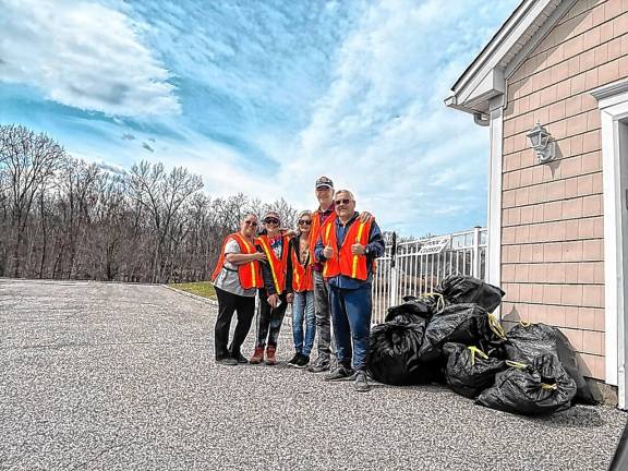 <b>Residents of Clove Hill Manor in Wantage collected 11 bags of trash during a community cleanup March 29. Supplies were provided by Clean Communities. (Photo provided)</b>