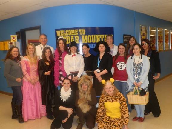 Front row,&#xa0;Ms. Elizabeth Norman &#x2013; Bad Kitty; Mrs. Jannine Czifra &#x2013; A Fox In Socks; Mrs. Maryellen Andersen &#x2013; Tigger; middle row, Mrs. Meghan Lowery &#x2013; Hermione Granger, Miss Lauren Massie &#x2013; Sleeping Beauty, Miss Noel Lethbridge &#x2013; Hermione Granger, Miss Kimberly Margolin &#x2013; Fancy Nancy, Mrs. Stacy Blanco &#x2013; Mary Poppins, Ms. Cindy Monico &#x2013; Amelia Bedelia, Mrs. Megan Alongi &#x2013; Miss Viola Swamp, Miss Sarah Winzer &#x2013; Thing 1, Miss Jaclyn Goffredo &#x2013; Dorothy Gale; Back: Principal, Mr. Dennis Mudrick, Mrs. Stephanie Fischer &#x2013; School Nurse, Mrs. Maureen Burns-Dewland &#x2013; Violet Beauregarde and Mrs. Stephanie Que &#x2013; Detective Jane Rizzoli.