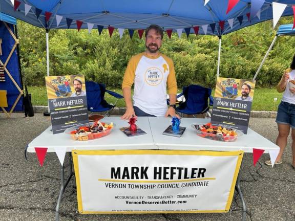 Township Council candidate Mark Heftler did some campaigning at the street fair.