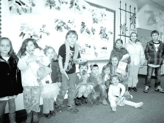 Photo by Viktoria-Leigh Wagner Preschoolers through third-graders are shown in their pajamas at Literacy Night.