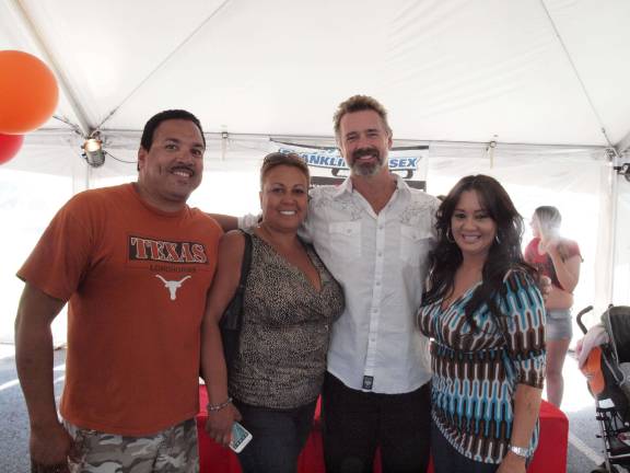 Music DJ Eddie Santana of Hamburg with family members Carmen Santana and Millie Moran with actor John Schneider.