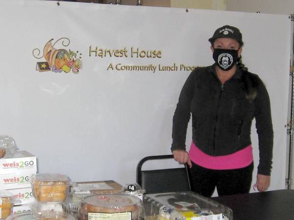 Denise O’Connor prepares for the day at Harvest House. (Photo by Janet Redyke)
