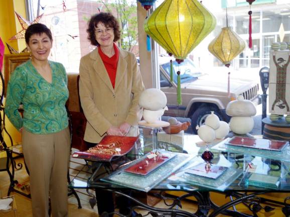 From the left, local artist Agatha Wyman and store owner Sussan Chakamian with a display of Wyman’s ceramic pieces at the Silken Wool Home store in Warwick, N.Y.