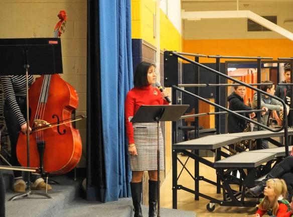 Principal Rosemary Gebhardt narrates, &quot;Twas the Night Before Christmas&quot; with the orchestra.