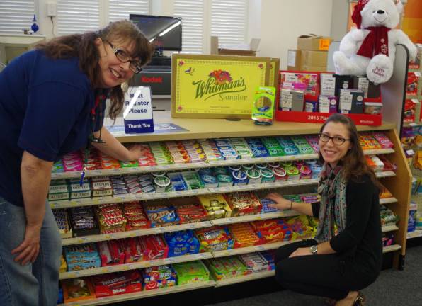 On Saturday before the store opened, Assistant Manager JoAnna Houghtaling of Ogdensburg and employee Kate Lasorsa of Barry Lakes were putting the finishing touches on the displays and stock throughout the store.