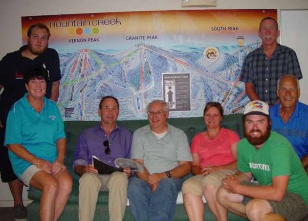 Photo courtesy John Whiting Adaptive Ski Program committee &amp; Mountain Creek President Bill Benneyan seated second from left and Ski Director Tim Stone , right in cap.