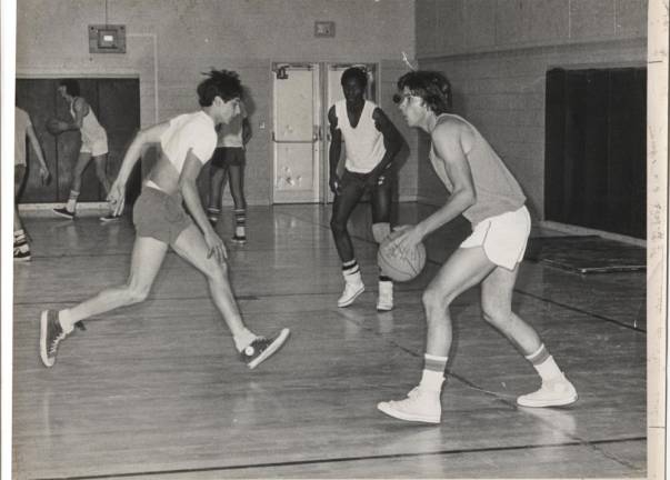 From left are Mike Ferrara, Milt Wilson and Nick Stefkovich during a Franklin High School team practice. Pete Van England is in the background on a side court.