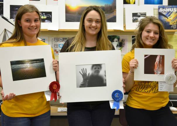 Megan McCann (c), won first place in the Vernon Historical Society Photo Contest with a photo of her grandmother. Amber Revelant (l) placed second. Carly Czifra (r) placed third.