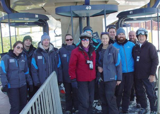 Buffy &amp; John Whiting join the Lift Ops staff supervised by Melissa Baker, Pierson Krass, Marketing Director &amp; On Snow Program Director Tim Stone for a photo prior to opening the Cabriolet lift on opening day.