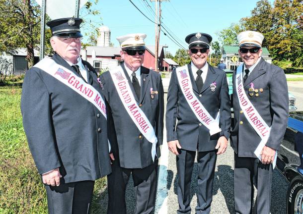 <b>Steve Funnell, Grant Rome, and Michael and Lou Cecchini of the Sussex Fire Dept. were the grand marshals.</b>