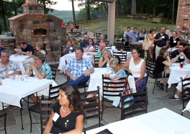 The audience listens as awards are announced at the 2015 Kitchen Garden Tour reception at Mohawk House, The Restaurant. This year's 2016 Kitchen Garden Tour is Sunday, July 24. Tickets on sale now at kitchengardentours.com.